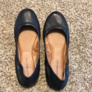 Black leather flats